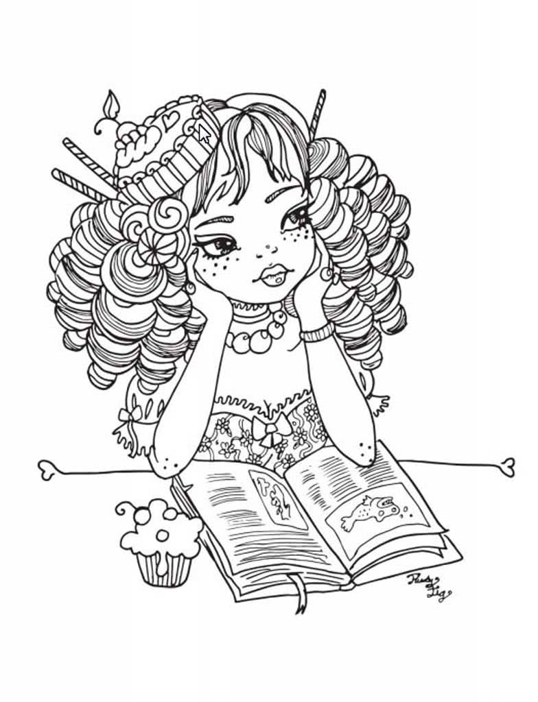 Девочка с пирожным сидит за книгой