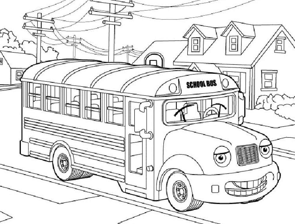 Школьный автобус с глазками мчит по дороге в городе