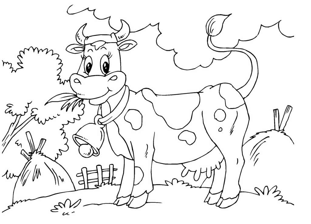 Корова жует траву в загоне
