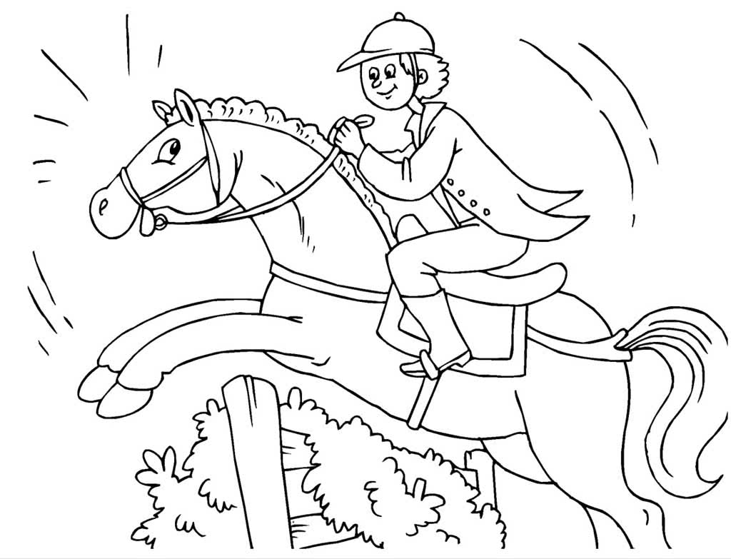 Мальчик на коне перепрыгивает через преграду