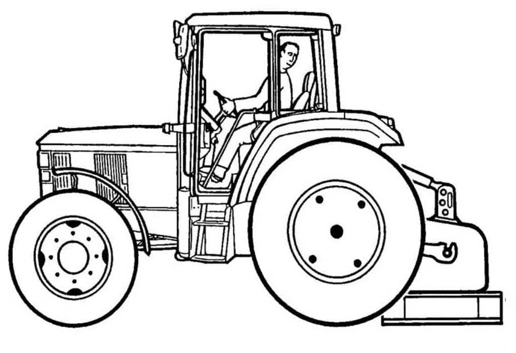 Тракторист за рулем трактора